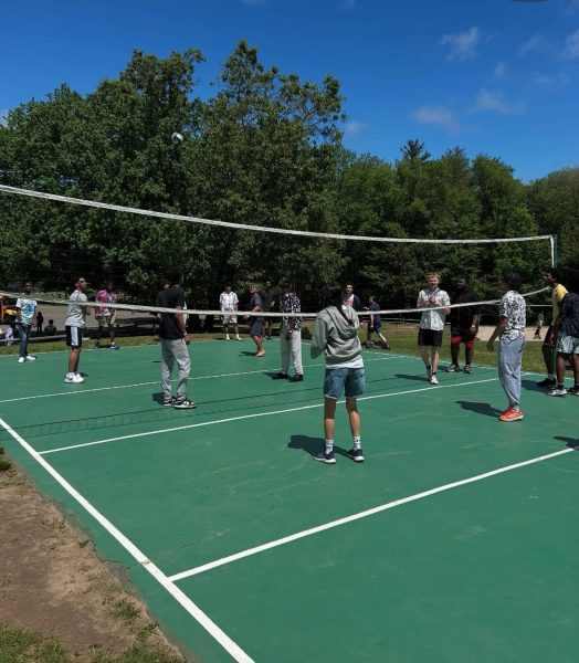 Students pictured playing volleyball at High Meadows Resort on May 19. 